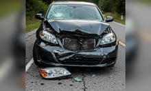 Can a lienholder dispute an insurer's valuation of a totaled car?
