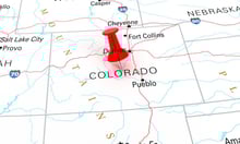 Colorado governor renews push to privatize Pinnacol Assurance